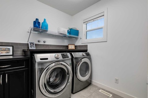 282 Mountainview Drive, Okotoks, AB - Indoor Photo Showing Laundry Room