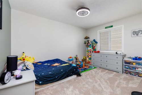 282 Mountainview Drive, Okotoks, AB - Indoor Photo Showing Bedroom