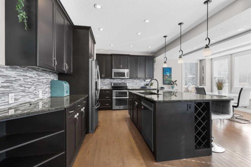 282 Mountainview Drive, Okotoks, AB - Indoor Photo Showing Kitchen With Upgraded Kitchen