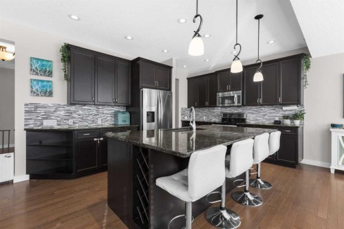 282 Mountainview Drive, Okotoks, AB - Indoor Photo Showing Kitchen With Upgraded Kitchen