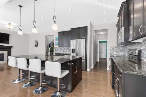 282 Mountainview Drive, Okotoks, AB - Indoor Photo Showing Kitchen With Upgraded Kitchen