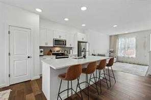 115 Legacy Passage Se, Calgary, AB - Indoor Photo Showing Kitchen With Stainless Steel Kitchen With Upgraded Kitchen