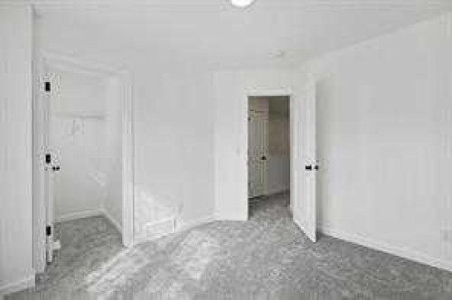 115 Legacy Passage Se, Calgary, AB - Indoor Photo Showing Other Room