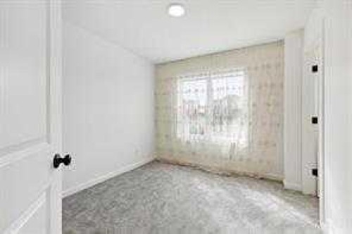 115 Legacy Passage Se, Calgary, AB - Indoor Photo Showing Other Room