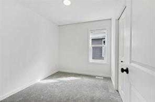 115 Legacy Passage Se, Calgary, AB - Indoor Photo Showing Other Room