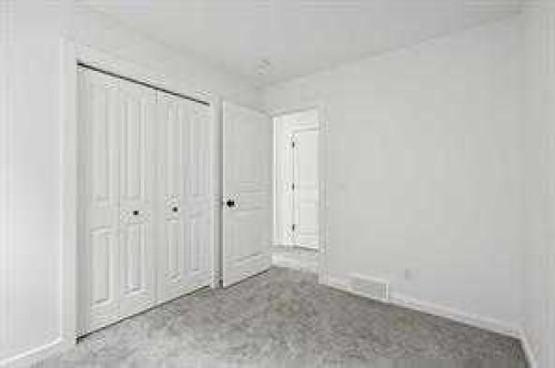 115 Legacy Passage Se, Calgary, AB - Indoor Photo Showing Other Room