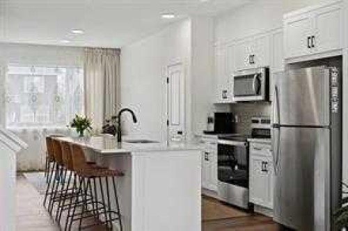 115 Legacy Passage Se, Calgary, AB - Indoor Photo Showing Kitchen With Stainless Steel Kitchen