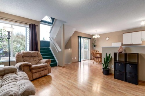 168 Mt Apex Green Se, Calgary, AB - Indoor Photo Showing Living Room