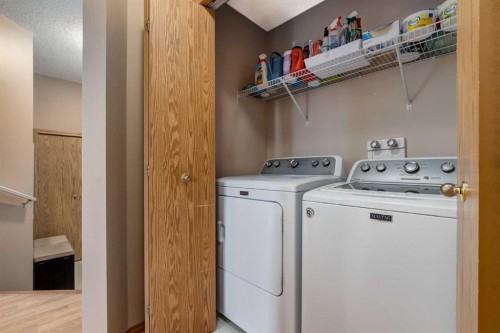 168 Mt Apex Green Se, Calgary, AB - Indoor Photo Showing Laundry Room