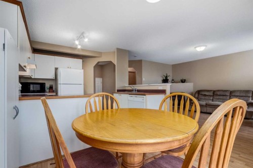 168 Mt Apex Green Se, Calgary, AB - Indoor Photo Showing Dining Room