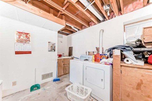 224 Berwick Way Nw, Calgary, AB - Indoor Photo Showing Laundry Room