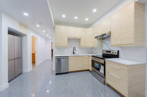 5003 21 Avenue Nw, Calgary, AB - Indoor Photo Showing Kitchen With Upgraded Kitchen