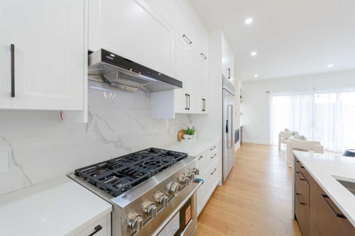 5003 21 Avenue Nw, Calgary, AB - Indoor Photo Showing Kitchen With Double Sink With Upgraded Kitchen