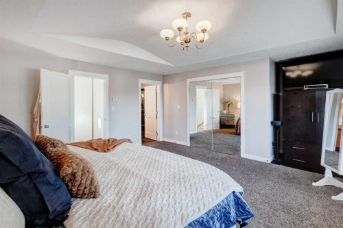38 Lissington Drive Sw, Calgary, AB - Indoor Photo Showing Bedroom