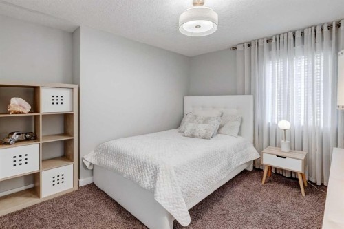 38 Lissington Drive Sw, Calgary, AB - Indoor Photo Showing Bedroom