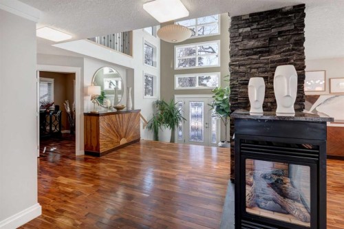 38 Lissington Drive Sw, Calgary, AB - Indoor With Fireplace