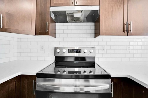 137 Pantego Lane Nw, Calgary, AB - Indoor Photo Showing Kitchen With Stainless Steel Kitchen With Upgraded Kitchen