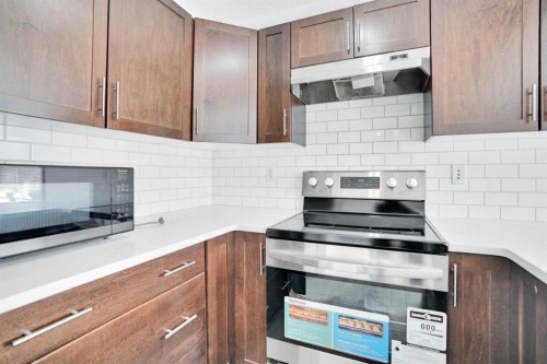 137 Pantego Lane Nw, Calgary, AB - Indoor Photo Showing Kitchen