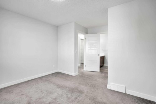 137 Pantego Lane Nw, Calgary, AB - Indoor Photo Showing Other Room
