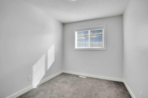 137 Pantego Lane Nw, Calgary, AB - Indoor Photo Showing Other Room