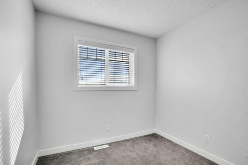 137 Pantego Lane Nw, Calgary, AB - Indoor Photo Showing Other Room