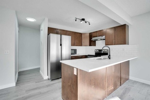 137 Pantego Lane Nw, Calgary, AB - Indoor Photo Showing Kitchen With Stainless Steel Kitchen