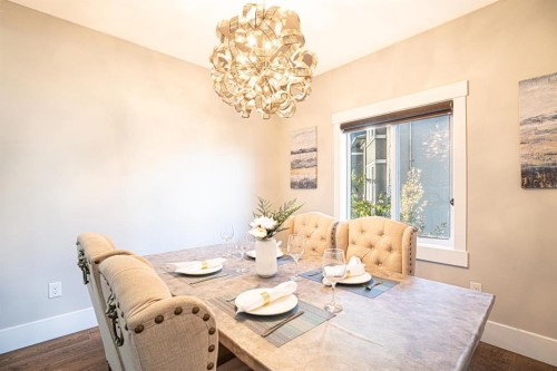 321 Kinniburgh Cove, Chestermere, AB - Indoor Photo Showing Dining Room