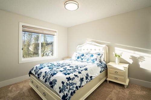 321 Kinniburgh Cove, Chestermere, AB - Indoor Photo Showing Bedroom