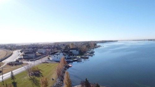 321 Kinniburgh Cove, Chestermere, AB - Outdoor With Body Of Water With View