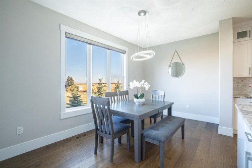 321 Kinniburgh Cove, Chestermere, AB - Indoor Photo Showing Dining Room