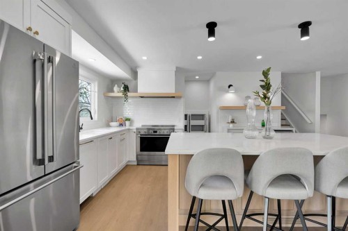 928 Lake Twintree Crescent Se, Calgary, AB - Indoor Photo Showing Kitchen With Upgraded Kitchen