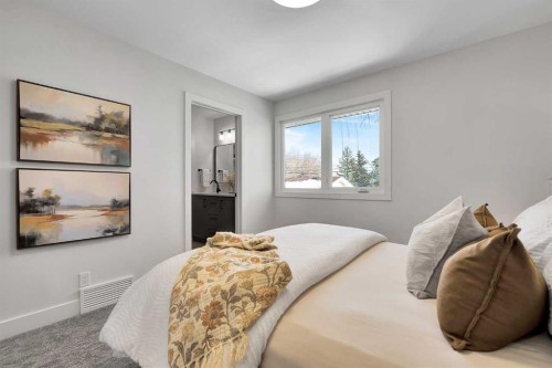 928 Lake Twintree Crescent Se, Calgary, AB - Indoor Photo Showing Bedroom