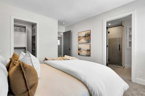 928 Lake Twintree Crescent Se, Calgary, AB - Indoor Photo Showing Bedroom