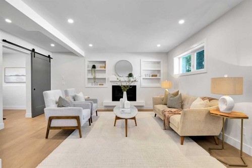 928 Lake Twintree Crescent Se, Calgary, AB - Indoor Photo Showing Living Room