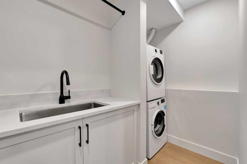 928 Lake Twintree Crescent Se, Calgary, AB - Indoor Photo Showing Laundry Room