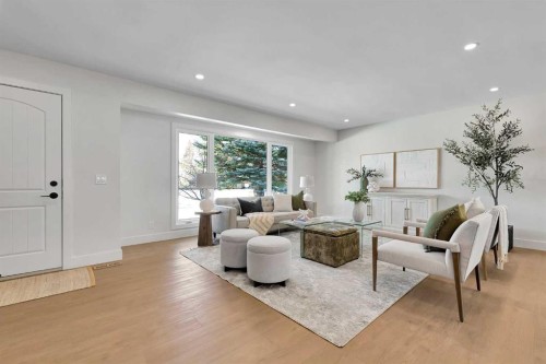928 Lake Twintree Crescent Se, Calgary, AB - Indoor Photo Showing Living Room