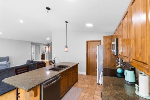 29 Sandpiper Drive, Didsbury, AB - Indoor Photo Showing Kitchen With Double Sink