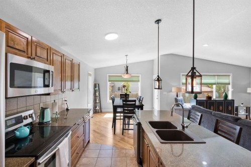29 Sandpiper Drive, Didsbury, AB - Indoor Photo Showing Kitchen With Double Sink