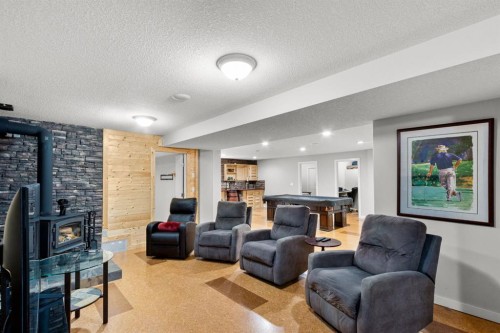 29 Sandpiper Drive, Didsbury, AB - Indoor Photo Showing Living Room With Fireplace