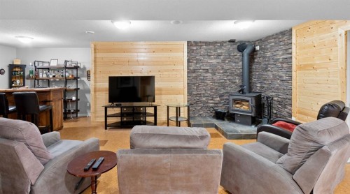 29 Sandpiper Drive, Didsbury, AB - Indoor Photo Showing Living Room With Fireplace