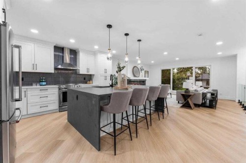 10404 Maplemont Road Se, Calgary, AB - Indoor Photo Showing Kitchen With Stainless Steel Kitchen With Upgraded Kitchen