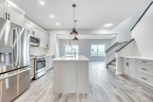 230 Wildrose Drive, Strathmore, AB - Indoor Photo Showing Kitchen With Upgraded Kitchen