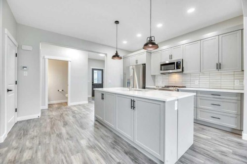 230 Wildrose Drive, Strathmore, AB - Indoor Photo Showing Kitchen With Upgraded Kitchen