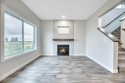 230 Wildrose Drive, Strathmore, AB - Indoor Photo Showing Other Room With Fireplace