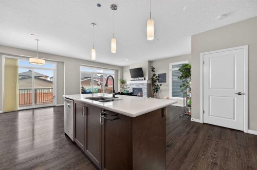 15 Fireside Crescent, Cochrane, AB - Indoor Photo Showing Kitchen With Double Sink