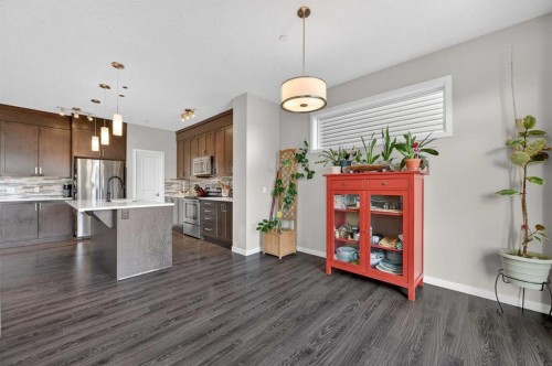 15 Fireside Crescent, Cochrane, AB - Indoor Photo Showing Kitchen With Upgraded Kitchen