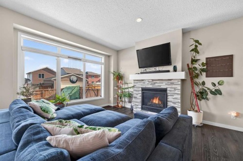 15 Fireside Crescent, Cochrane, AB - Indoor Photo Showing Living Room With Fireplace