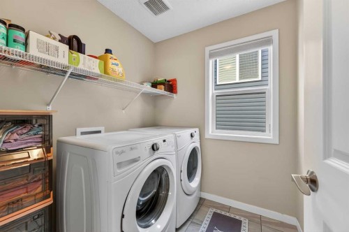 15 Fireside Crescent, Cochrane, AB - Indoor Photo Showing Laundry Room