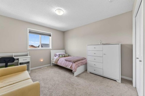 15 Fireside Crescent, Cochrane, AB - Indoor Photo Showing Bedroom