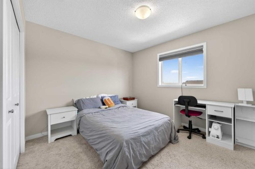 15 Fireside Crescent, Cochrane, AB - Indoor Photo Showing Bedroom